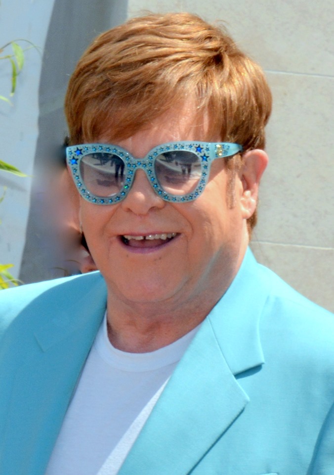 Elton John in Sky Blue Blazer